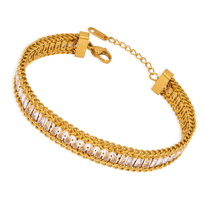 Moissanite inlaid gold bracelet