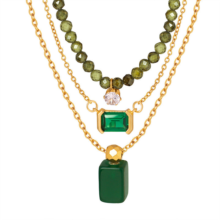 luxury and elegant inlaid design emerald gold necklace