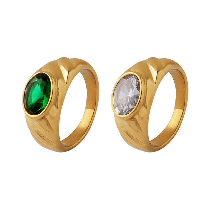 Gold ring with white and green diamonds